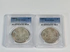 Lot Of 2: 1885-O PCGS MS 64+ Morgan Dollars $1