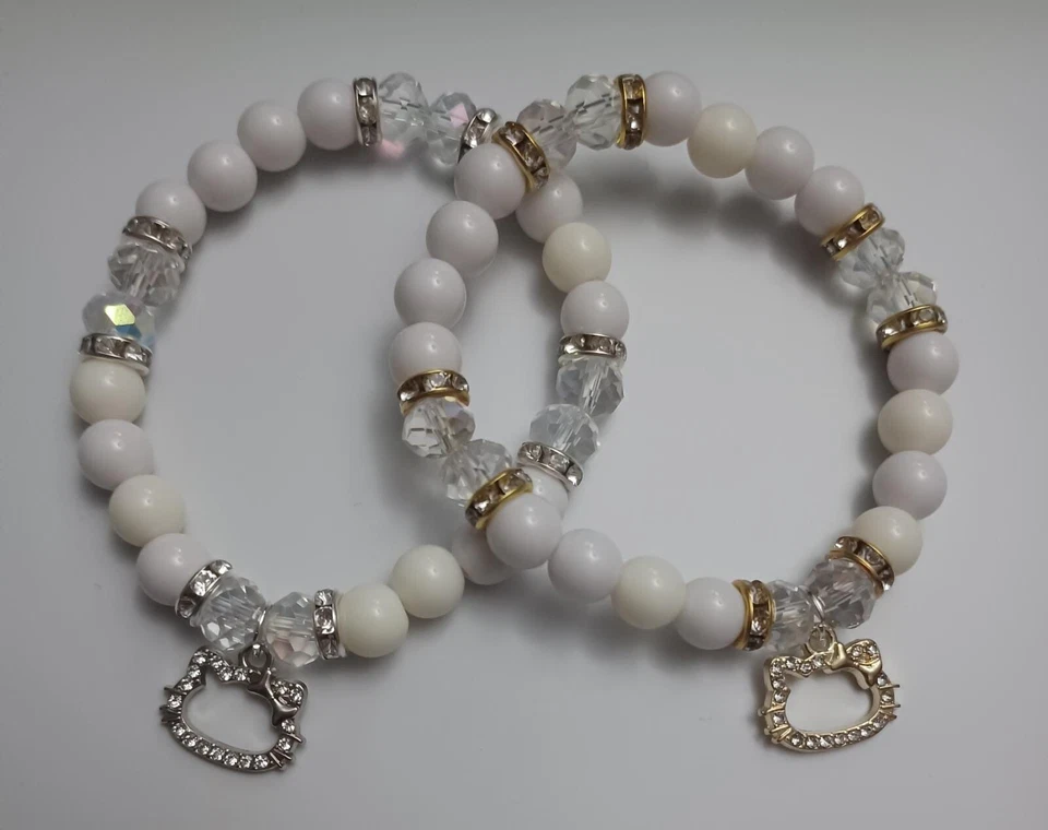 Pulsera Hello Kitty blanca plateada y dorada 2 piezas Foto 2 de 2