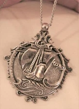 Handsome Flute & Furled Rim Galleon Pirate Ship on the Sea Silvertone Necklace