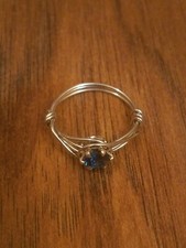 Wire wrapped ring with 6mm swiss blue CZ size 7 art deco style