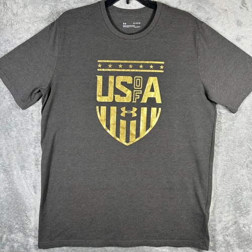 Under Armour Herren XL Hemd USA Logo Grafik Loose Fit Grau Gold Heatgear