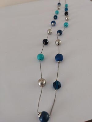 Accessorize long mixed bead blue Turquoise Navy necklace.