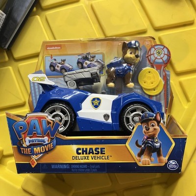 Paw Patrol The Movie Chase DLX Vehicle Dog Figurine Police Car Disc Shooter