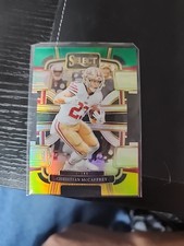 23 Panini Select - Concourse Christian McCaffrey #88 Black & Green Prizm Die-Cut