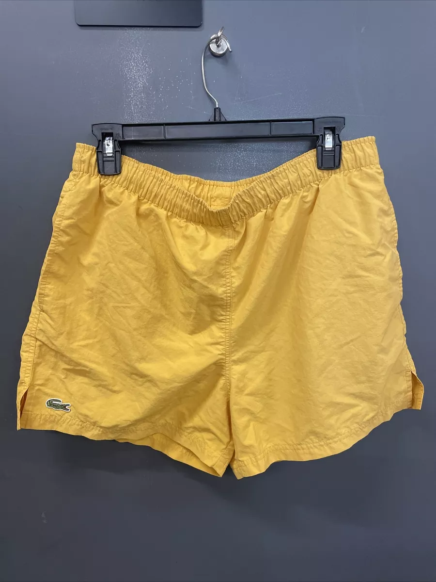 Yellow lacoste shorts sale
