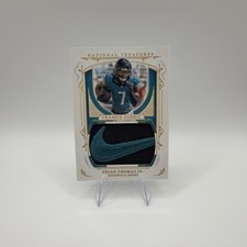 2025 Panini National Treasures - Framed Fabric Brian Thomas Jr Nike Swoosh /10 
