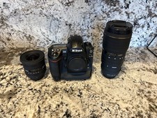 Nikon D3 DSLR camera with 2 sigma lenses