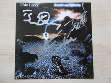 Thin Lizzy autographs signed CD booklet "Thunder and Lightning"
