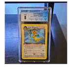 Pokémon TCG Team Rocket Dark Dragonite 22/82 1st Ed Holo CGC 8 English 2000