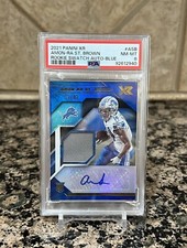 2021 Panini XR  AMON-RA ST. BROWN RPA ROOKIE SWATCH AUTO “BLUE” /49  PSA 8 NM-MT