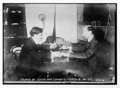 Photo:Baron von Erhardt Mandolin in Air S�ance 1910s Men at Table