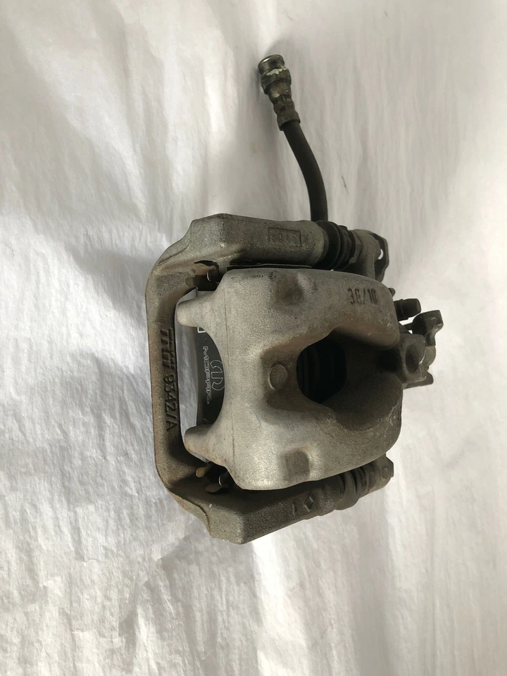 Pinza de disco de freno delantera Fiat 500 2014 1,4 L A/T lado del conductor izquierdo LH G Foto 2 de 4