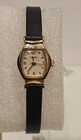 Vintage Timex Ladies Quartz Watch Gold Tone Black Strap Small Dress Watch