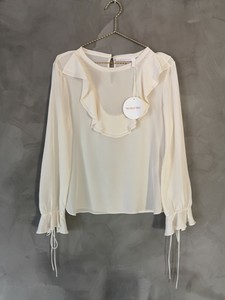 cream ruffle blouse