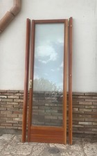 1 porta finestra in legno massello artigianale a un anta senza vetri con telaio