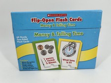 Scholastic Flip-Open Flash Cards Money and Telling Time 64 Sturdy Cards