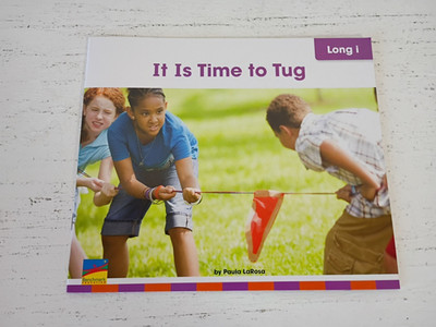 It is a Time T - Benchmark Start Up Phonics Book - #28 - Long i - Paula LaRosa
