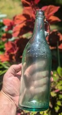 Vintage Curran & Joyce Co. Inc. Lawrence, Mass. 28 oz bouteille de soda avec plateau en céramique
