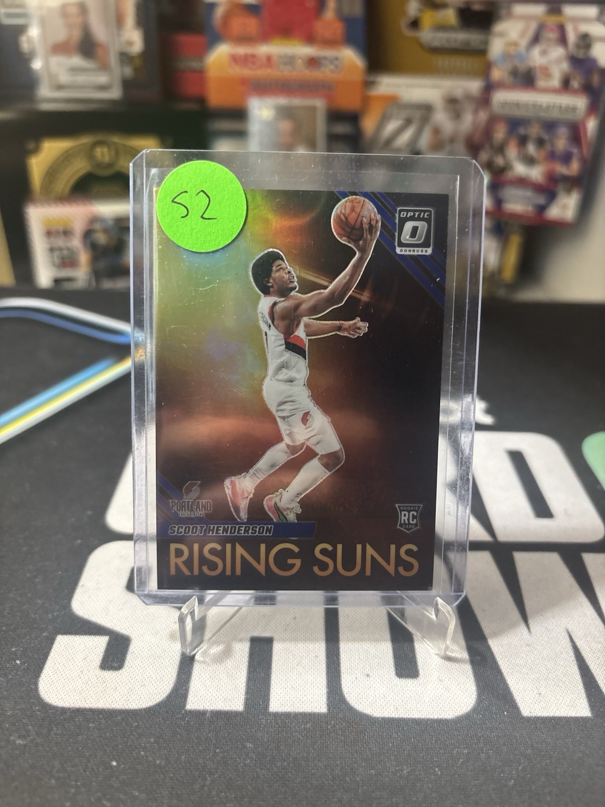 2023 Panini Donruss Optic - Rising Suns Blue Prizm #17 Scoot Henderson /49 (RC)