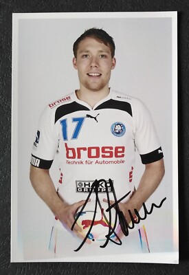 8761 Jan Artmann Bergischer HC Handball Foto original signiert