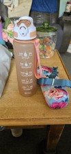 HydroMATE 32 Oz Plastic Water Bottle. Hourly Hydration Motivation - Pink
