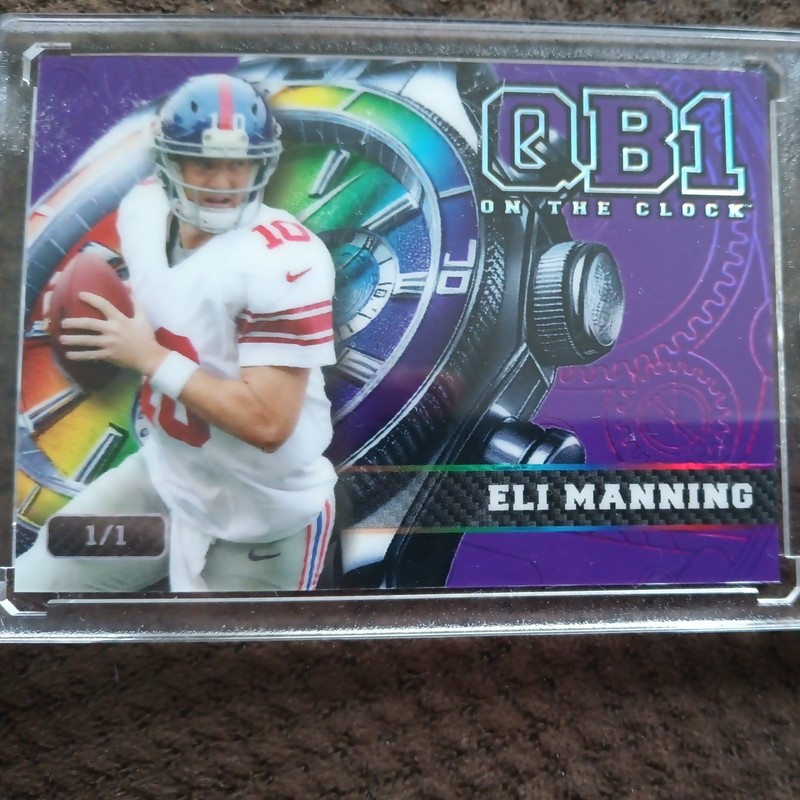2024 Wild Card Qb1 On the Clock Eli Manning #OCW-PL-EM2 Purple-Red Foil 1 of 1