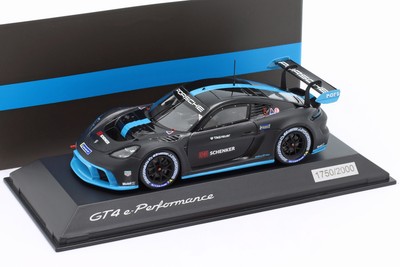 Porsche 718 Cayman GT4 e-Performance 2022 schwarz / blau 1:43 Spark