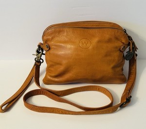 The Provence Handbag – The Wanderers Travel Co Wanderers travel co clasp ball closure leather clutch handbag camel brown main image 1