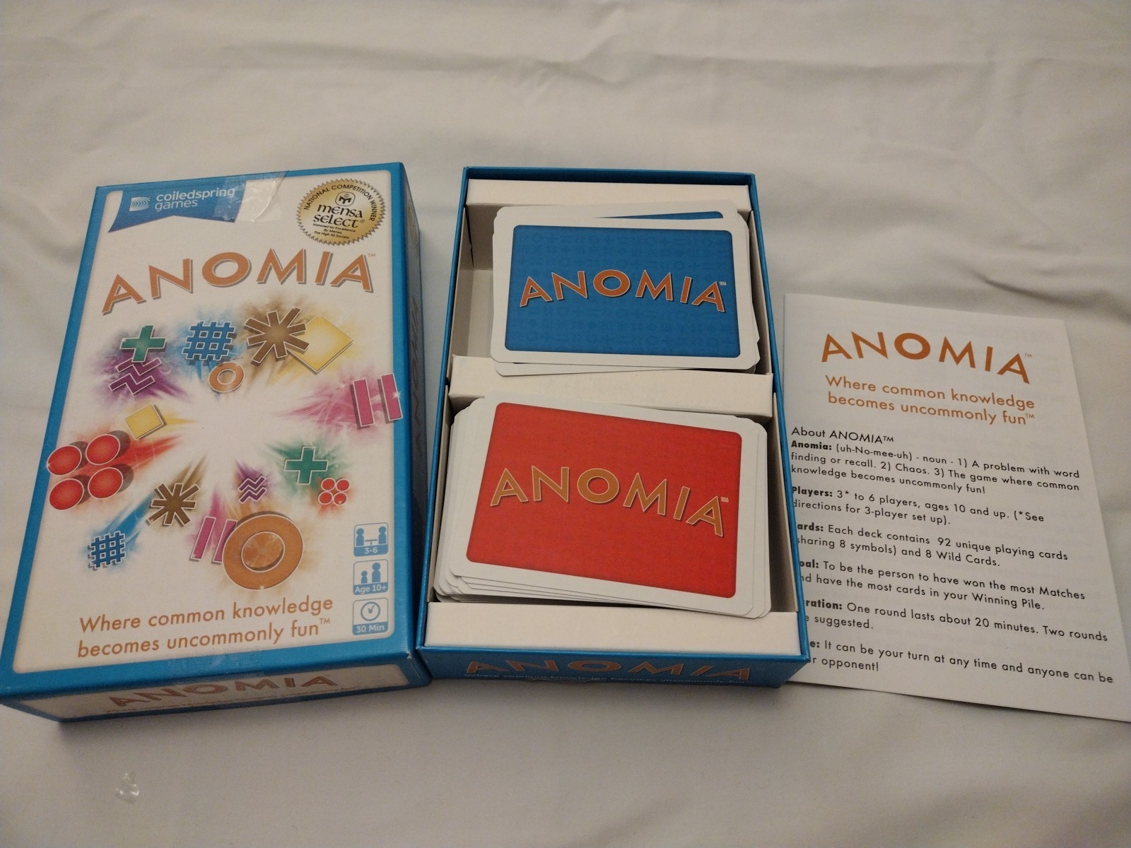Anomia Card Game by Coiled Spring - Where Common Knowledge Becomes Fun VGC
