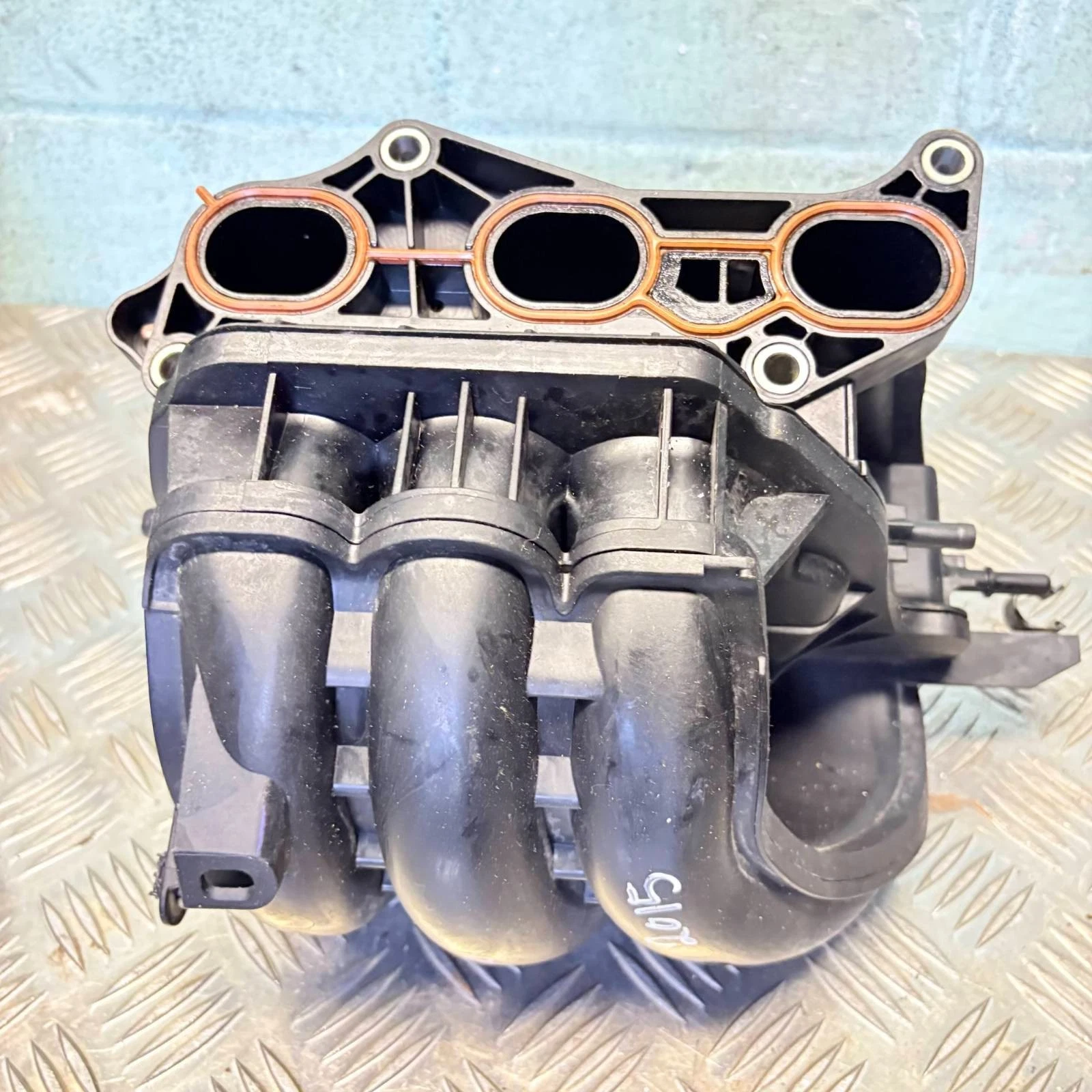 Actual Toyota Aygo 1KR-FE intake manifold cylinder head port face