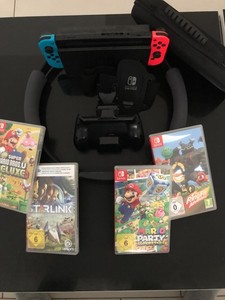 Nintendo Switch 1 mit Spielen und Zubehör (ohne Kratzer im Display)