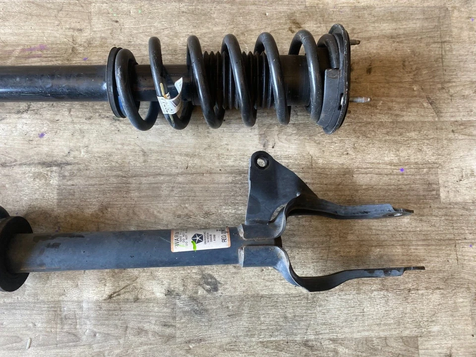 JUEGO AMORTIGUADOR DELANTERO IZQUIERDO Y DERECHO DODGE DURANGO GRAND CHEROKEE OEM AWD Foto 3 de 4