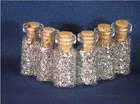 SILVER FLAKES IN 18 MINI GLASS BOTTLES NO LIQUID
