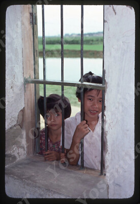 sl06 Original Slide  1970's China outside Canton girls smiling / window 636a