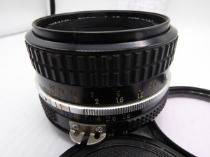 NIKON Ai Nikkor 50mm 1.8 with new filter. cleaned and serviced feb 2024.