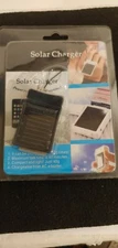 BLACK - MINI solar powered iphone charger ( can be charged up to 500 charges )