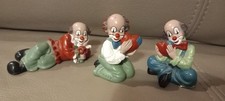 1 kleiner Gilde Clown (Bild links ) Sammelclown liegend mit Blumen
