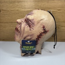 Spirit Halloween Stitched Face HangingNo Evil...
