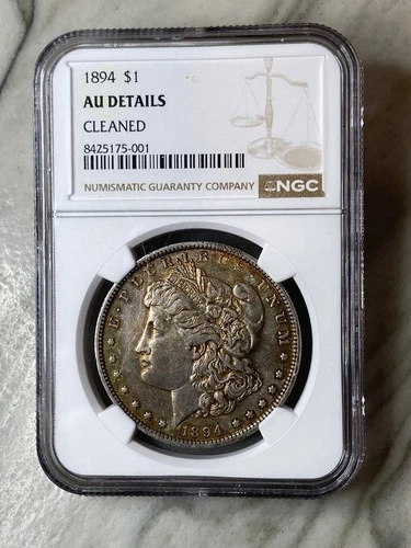 1894 Silver Morgan; NGC AU, cleaned