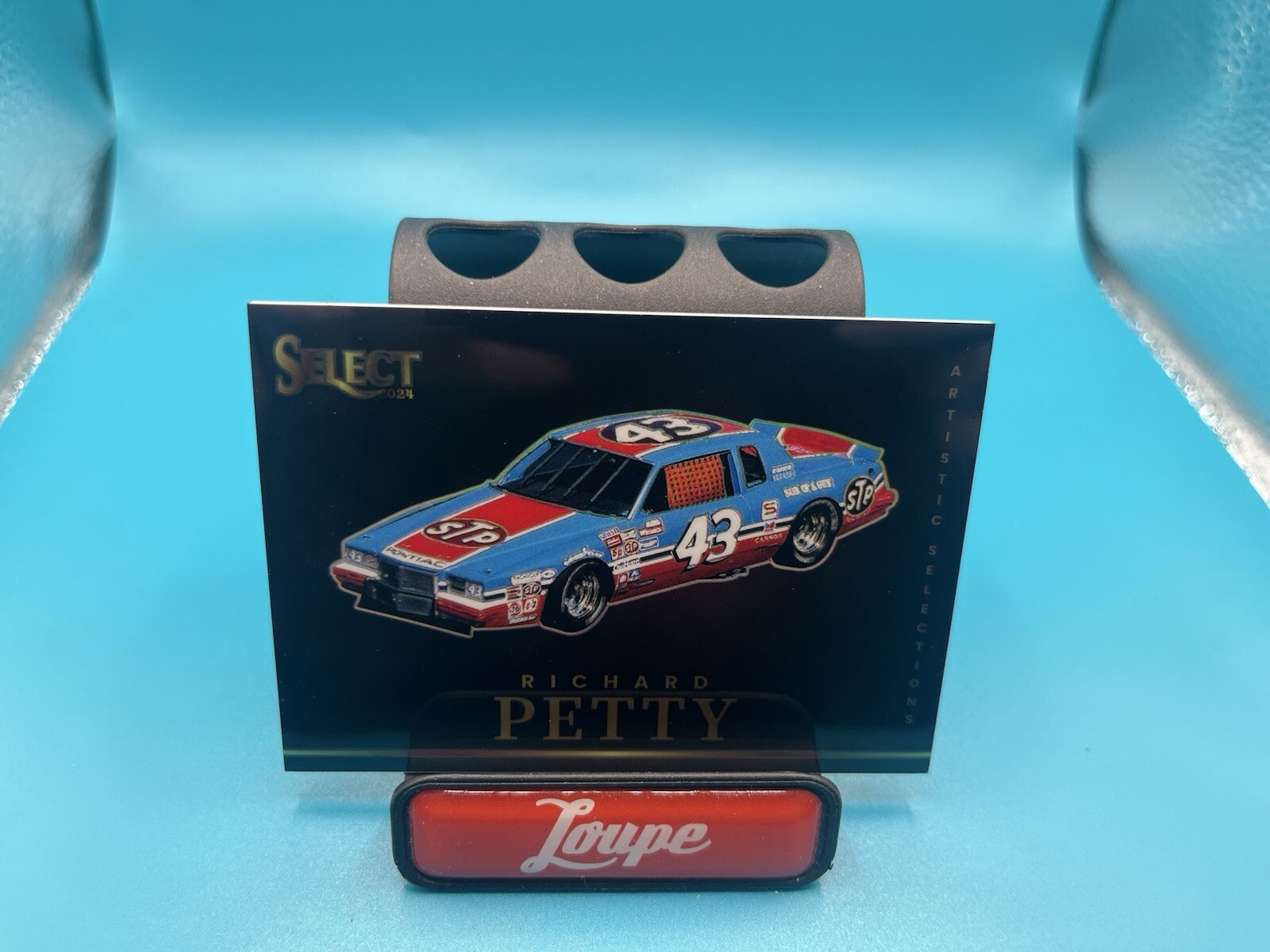 Richard Petty 2024 Panini Select Artistic Selections Case Hit SP #1 STP Pontiac
