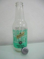 Schweppes classic Mojito :  a 280 ml empty  glass bottle,   Israel, 2024.