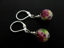 A PAIR OF SILVER PLATED PORCELAIN FLOWER  BEAD LEVERBACK HOOK EARRINGS. NEW.