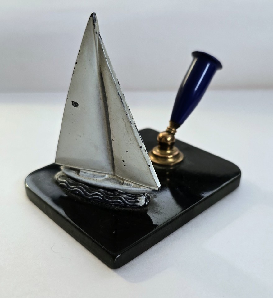 Art Deco nautical pen holder in black Bakelite — the kind of bold, sculptural desk piece that makes a home office look like a captain's quarters.