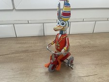 Canard Sur Tricycle Western Jouet Mécanique En Tôle Avec Sa Clé 