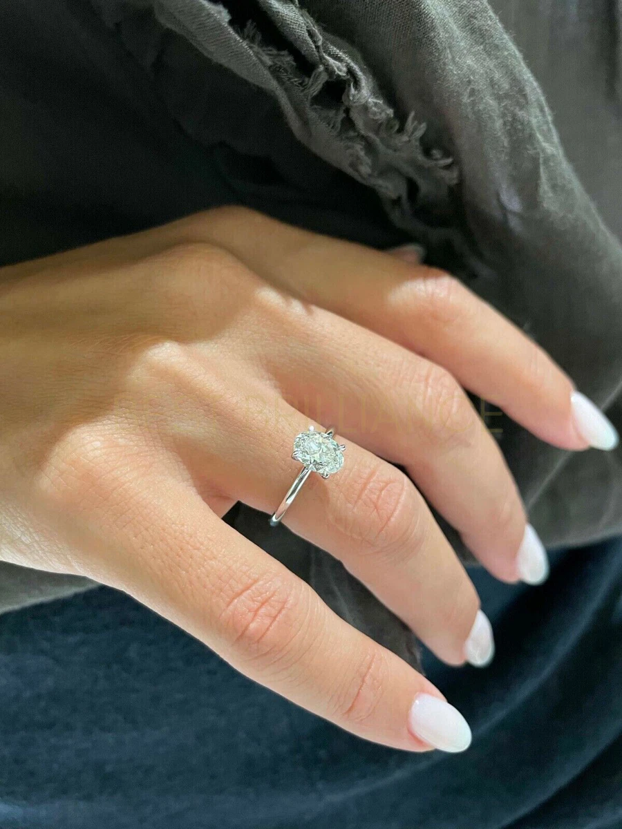 Oval solitaire hotsell gold engagement ring