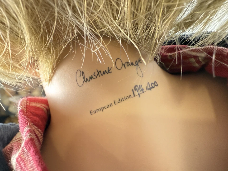 Bambola artistica da collezione ragazzo Christine arancione bambola di porcel... - Immagine 2 di 4