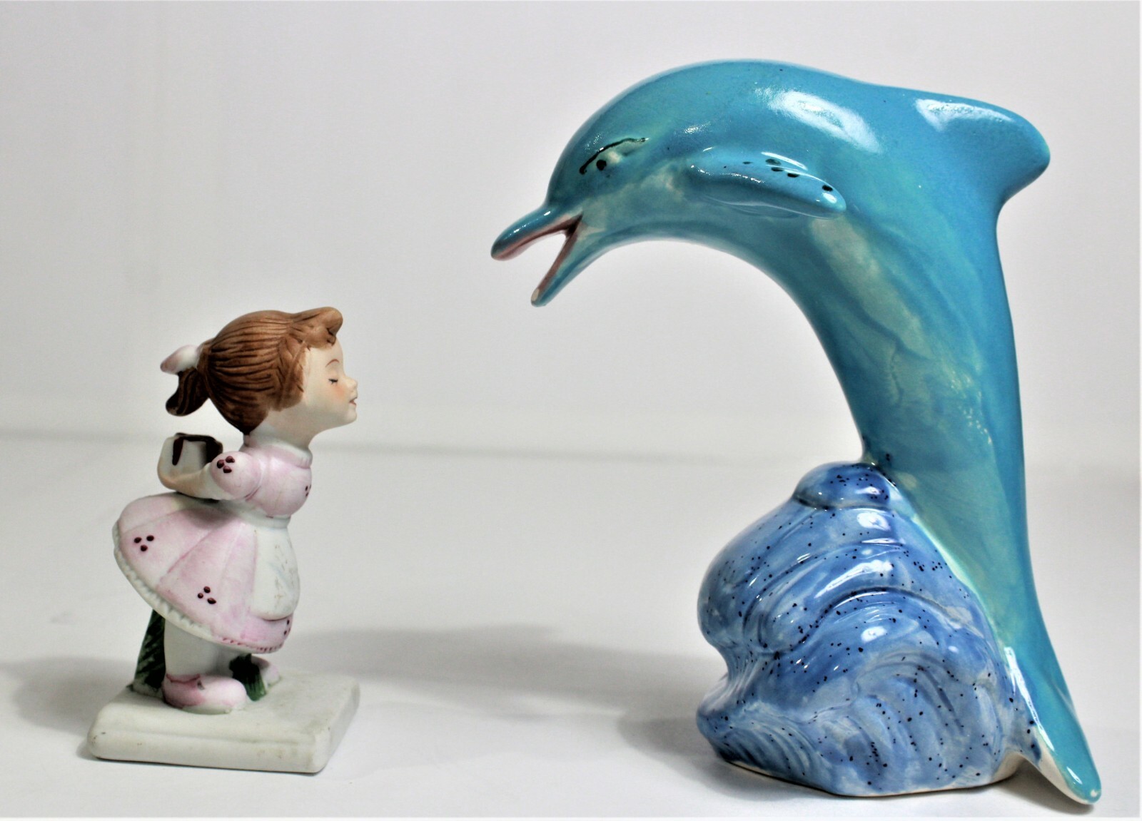 Adorable Porcelain figurine Blue Dolphin & Girl excited for a gift