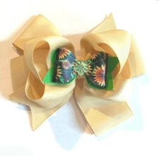 Beautiful Light Gold with a green Faux Crystal Inspired Hair Bow for girls