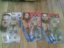 WWE AJ Styles, Otis, Baron Corbin Action Figures