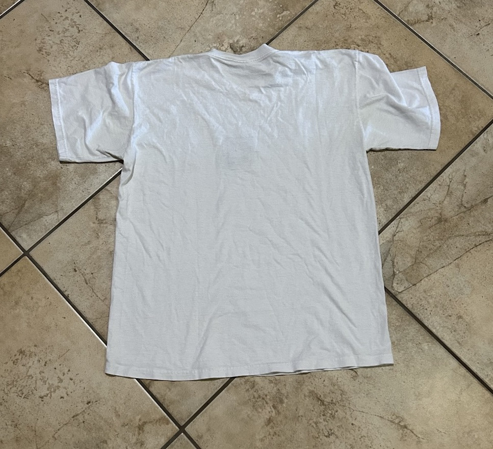 T shirt FILA vintage anni 90 maglietta grafica ricamata logo invecchiato taglia media